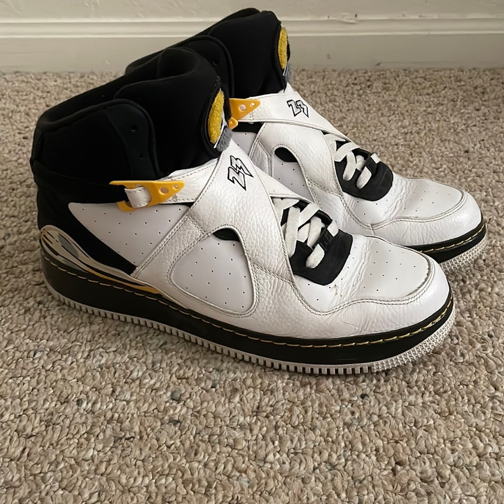 Black, white and yellow Jordans